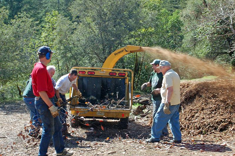 Chipper At Work 1.jpg - Still grinding away; that was quite a large branch!